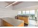 Modern kitchen featuring stylish countertops, cabinetry and a large window with expansive views at 2201 N Central Ave # 3D, Phoenix, AZ 85004