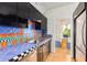 Unique kitchen features colorful tile counters, stainless steel sink, and ample storage at 2201 N Central Ave # 3D, Phoenix, AZ 85004