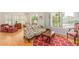 Inviting living room with large windows, hardwood floors and stylish furnishings at 2201 N Central Ave # 3D, Phoenix, AZ 85004