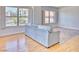Spacious living room featuring hardwood floors and a comfortable sofa with large windows for natural light at 2201 N Central Ave # 3D, Phoenix, AZ 85004