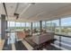 Open living room with stylish seating, and large windows with scenic views at 2201 N Central Ave # 3D, Phoenix, AZ 85004