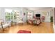 Bright living room with large windows offering lots of natural light and hardwood floors at 2201 N Central Ave # 3D, Phoenix, AZ 85004