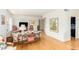 Comfortable living area featuring hardwood floors, windows, and colorful decor at 2201 N Central Ave # 3D, Phoenix, AZ 85004
