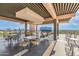 Spacious roof deck with wrought iron furniture and scenic city views at 2201 N Central Ave # 3D, Phoenix, AZ 85004