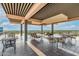 Inviting rooftop terrace offering ample seating and panoramic city vistas at 2201 N Central Ave # 3D, Phoenix, AZ 85004