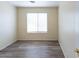 Sunny bedroom featuring wood flooring and lots of natural light at 231 N Nash Way, Chandler, AZ 85225