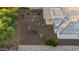 Aerial view of the property's backyard showcasing a covered patio and thoughtfully designed desert landscaping at 3020 N 165Th Ave, Goodyear, AZ 85395