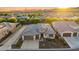 Beautiful aerial view of desert home with lush landscaping and a well maintained yard in a desirable community at 3020 N 165Th Ave, Goodyear, AZ 85395