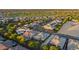 Stunning aerial view showcases a well-planned community nestled near a golf course and lush greenery at 3020 N 165Th Ave, Goodyear, AZ 85395