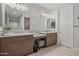 Bathroom featuring double sinks, counter space, and vanity at 3020 N 165Th Ave, Goodyear, AZ 85395