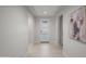 Bright entryway with modern door, neutral walls, and tile flooring at 3020 N 165Th Ave, Goodyear, AZ 85395