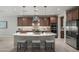 Stylish kitchen featuring a large island, stainless steel appliances, and ample cabinet space at 3020 N 165Th Ave, Goodyear, AZ 85395