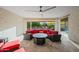 Outdoor patio with cushioned seating, fire pit, and desert landscaping at 3020 N 165Th Ave, Goodyear, AZ 85395