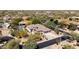 Spacious home aerial view featuring a sparkling pool, well-manicured landscaping, and desert views at 30434 N Palo Brea Dr, Scottsdale, AZ 85266