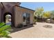Outdoor space featuring brick pavers, a built-in grill, and access to the home's interior at 30434 N Palo Brea Dr, Scottsdale, AZ 85266