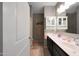Bathroom with a sink, vanity, mirror and shower at 31006 W Weldon Ave, Buckeye, AZ 85396