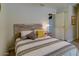 Comfortable bedroom with a cozy bed and a calming atmosphere at 3511 E Baseline Rd # 1104, Phoenix, AZ 85042
