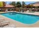 Beautiful community pool and spa with plenty of seating and meticulously maintained landscaping at 3511 E Baseline Rd # 1104, Phoenix, AZ 85042