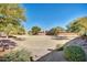 A large and well-manicured community lawn, perfect for outdoor recreation and relaxation at 36203 N Urika Dr, San Tan Valley, AZ 85140