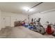 Spacious garage with ample storage space for equipment and bicycles at 36203 N Urika Dr, San Tan Valley, AZ 85140