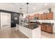 Modern kitchen features sleek countertops, stainless appliances, and an open design to adjacent rooms at 36203 N Urika Dr, San Tan Valley, AZ 85140