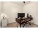 Office featuring a large desk with built in bookshelves and neutral paint at 36203 N Urika Dr, San Tan Valley, AZ 85140