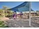 A vibrant playground in the community offers a fun and safe space for children to play at 36203 N Urika Dr, San Tan Valley, AZ 85140
