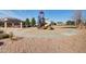 Community playground featuring a play structure with slides and climbing apparatus for outdoor fun at 36203 N Urika Dr, San Tan Valley, AZ 85140