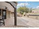 Outdoor patio with brick pavers, custom fireplace, and built-in grill, perfect for entertaining at 38953 N 57Th Pl, Cave Creek, AZ 85331