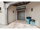 Inviting front entry featuring a double door, custom stone walkway, and decorative planters at 38953 N 57Th Pl, Cave Creek, AZ 85331