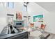Bright living room with fireplace, statement art, soaring ceilings, and inviting seating at 38953 N 57Th Pl, Cave Creek, AZ 85331
