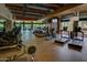 Community gym with modern equipment, wooden beam ceiling and scenic views at 3935 E Rough Rider Rd # 1252, Phoenix, AZ 85050