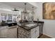 Open-concept kitchen flowing into a living area; perfect for entertaining guests at 3935 E Rough Rider Rd # 1252, Phoenix, AZ 85050