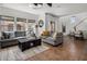 Bright living room with tile floors, neutral colors, and comfortable seating area at 3935 E Rough Rider Rd # 1252, Phoenix, AZ 85050