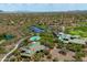 Aerial view of a clubhouse with a pool and desert landscaping at 42037 N Bradon Way, Phoenix, AZ 85086