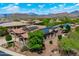 Scenic aerial view of the property, highlighting solar panels, desert surroundings, and mountain backdrop at 42037 N Bradon Way, Phoenix, AZ 85086