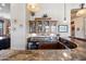 Close-up view of a home bar boasting granite counters, custom cabinets, and decorative lighting fixtures at 42037 N Bradon Way, Phoenix, AZ 85086
