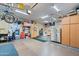 Spacious garage with epoxy floors, built-in cabinets, and lots of room for storage at 42037 N Bradon Way, Phoenix, AZ 85086
