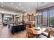 Well-lit kitchen with stainless appliances, eat-in table, and connection to the living room at 42037 N Bradon Way, Phoenix, AZ 85086