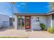 Striking red front door with desert landscaping, stylish lighting, and well-kept facade at 4206 N 38Th St # 1, Phoenix, AZ 85018