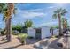 Well-maintained condo exterior showcasing modern design, landscaping, and desert plants at 4206 N 38Th St # 1, Phoenix, AZ 85018