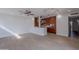 Open-concept living space with modern lighting, neutral walls, and wood-look flooring at 4206 N 38Th St # 1, Phoenix, AZ 85018
