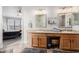 This bathroom has double sinks, and a view to the bedroom at 4292 E Terrace Ave, Gilbert, AZ 85234