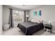 This bedroom has a large window and soft gray tones at 4292 E Terrace Ave, Gilbert, AZ 85234
