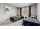 This bedroom features two twin beds and a large window at 4292 E Terrace Ave, Gilbert, AZ 85234