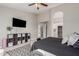 This bedroom features a TV, closet, and cube storage at 4292 E Terrace Ave, Gilbert, AZ 85234