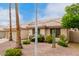 Charming single-story home featuring a well-maintained yard, beautiful landscaping, and a two-car garage at 4292 E Terrace Ave, Gilbert, AZ 85234