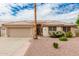 Charming single-story home featuring a well-maintained yard and a two-car garage, complemented by colorful landscaping at 4292 E Terrace Ave, Gilbert, AZ 85234