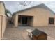 Exterior backyard featuring an extended patio at 43845 W Elizabeth Ave, Maricopa, AZ 85138