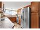 Updated kitchen with stainless steel appliances, ample cabinet space, and a bright window at 4549 W Mclellan Rd, Glendale, AZ 85301
